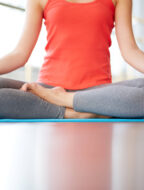 Female legs in lotus position